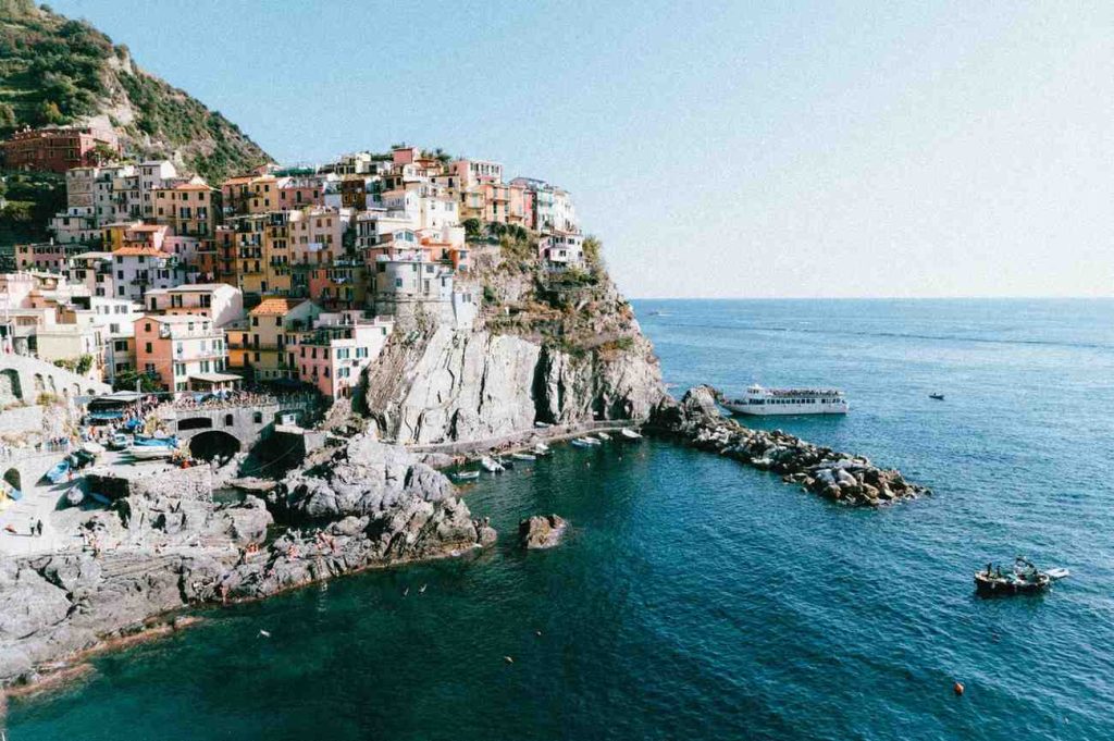 Colorful coastal village by sea